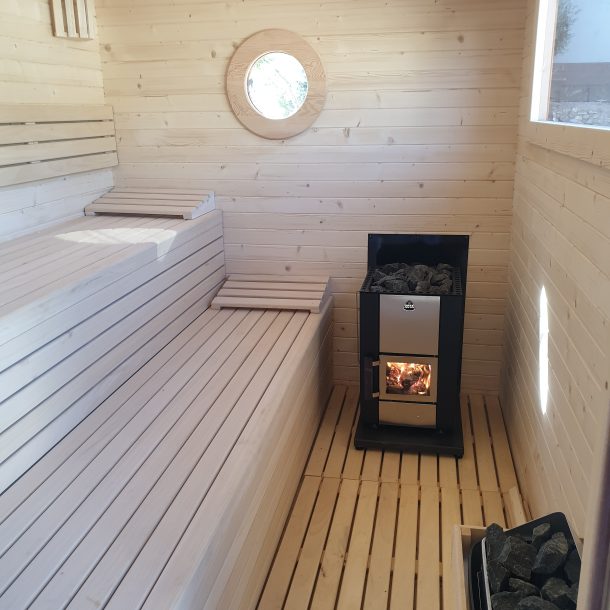 Sauna con estufa y calefactor